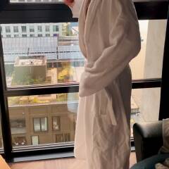 Petite Sweet milf showing in front of hotel window